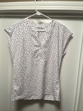 Ricki's flowy White and black Polka Dot Cap-Sleeve, split neck blouse. Small